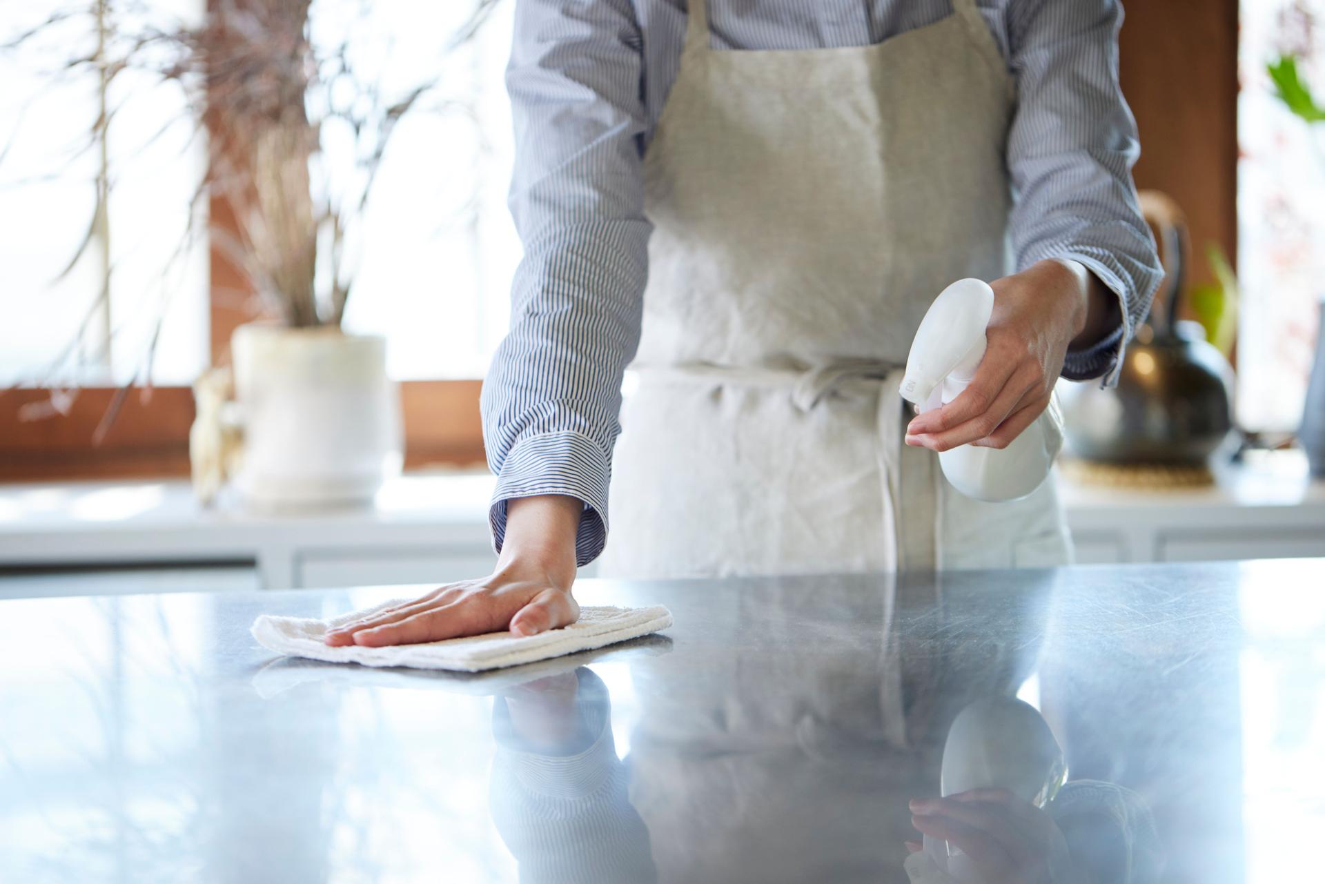 Young Japanese woman cleaning